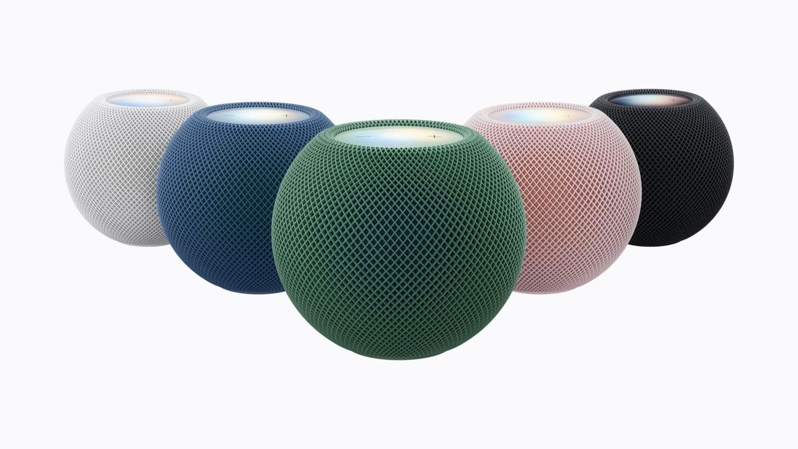 Five HomePod mini 2 speakers in white, blue, green, pink and midnight, with green in front.