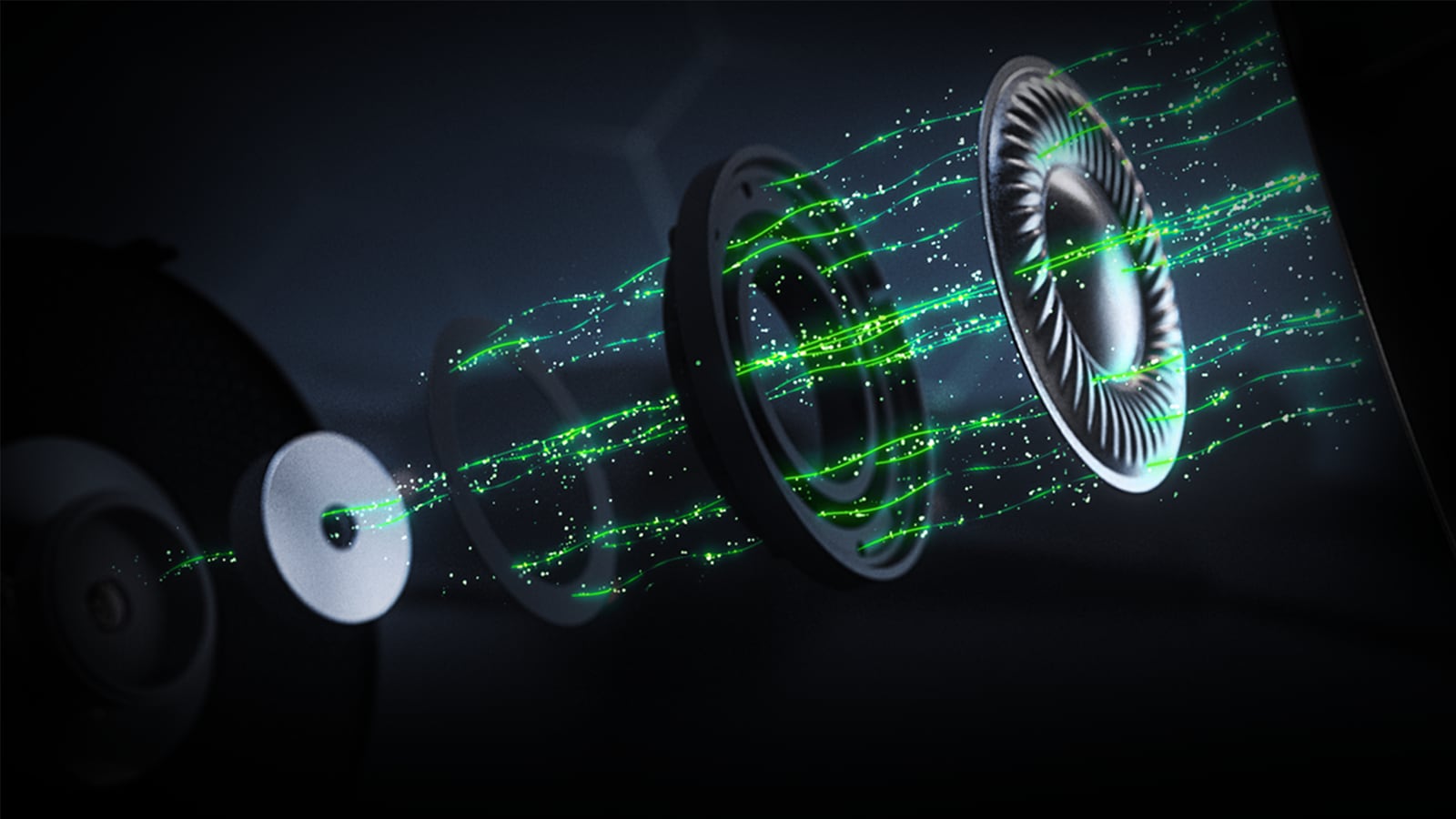 Exploded headphone driver components with green trails passing through the separated layers.