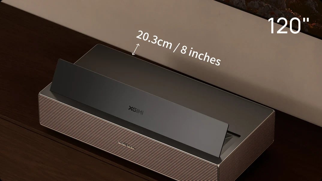AURA 3 projector beside a wall with labels showing 120 inches and an 8 inch gap.